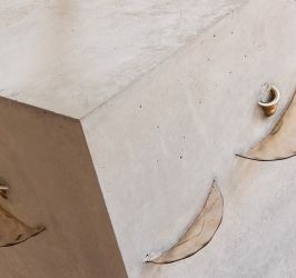 Piero Golia, Concrete cube with glass chandelier, 2024